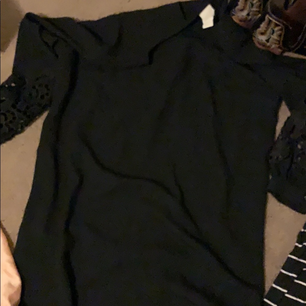 women’s cute black dress with details on sleeves